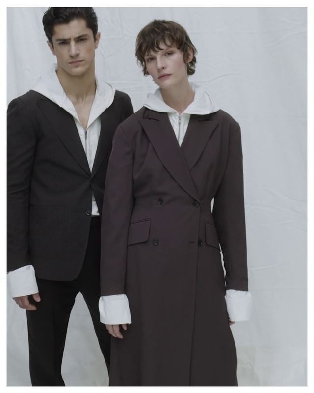 Video Reference: Dress shirt, Neck, Sleeve, Coat, Waist, Collar, Grey, Street fashion, Pantsuit, Fashion design