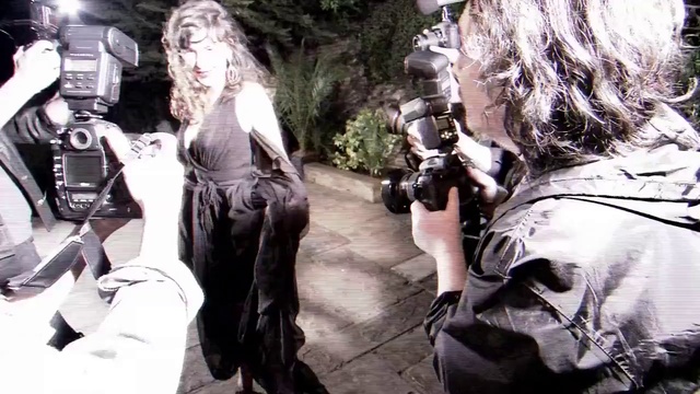 Video Reference: Hairstyle, Flash photography, Camera, Cool, Luggage and bags, Black hair, Street fashion, Bag, Event, Videographer