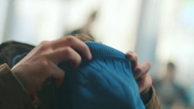 Video Reference: Sleeve, Gesture, Thumb, Finger, Nail, Wrist, Electric blue, Comfort, Fashion accessory, Wool