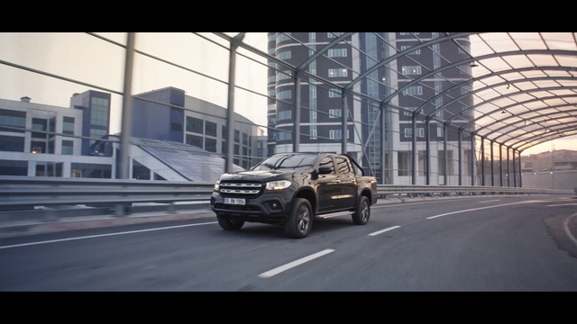 Video Reference: Tire, Automotive parking light, Wheel, Car, Vehicle, Automotive lighting, Building, Grille, Automotive tire, Automotive design