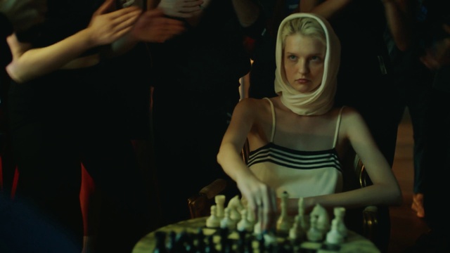 Video Reference: Arm, Human body, Chessboard, Table, Chess, Indoor games and sports, Fun, Chair, Recreation, Competition event
