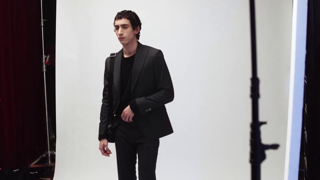 Video Reference: Suit trousers, Sleeve, Flash photography, Gesture, Collar, Dress shirt, Street fashion, Blazer, Formal wear, White-collar worker