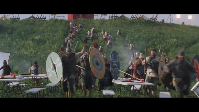 Video Reference: Drum, Plant, Musician, Shield, Membranophone, Musical instrument, Grass, Event, Leisure, Landscape