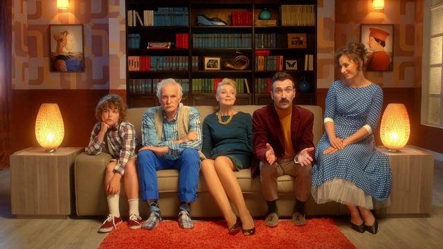 Video Reference: Picture frame, Leg, Dress, Lighting, Lamp, Bookcase, Comfort, Shelf, Yellow, Social group