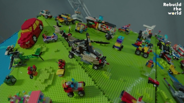 Video Reference: Toy, Motor vehicle, Urban design, Grass, Toy block, Biome, Construction set toy, Lego, Landscape, Building sets