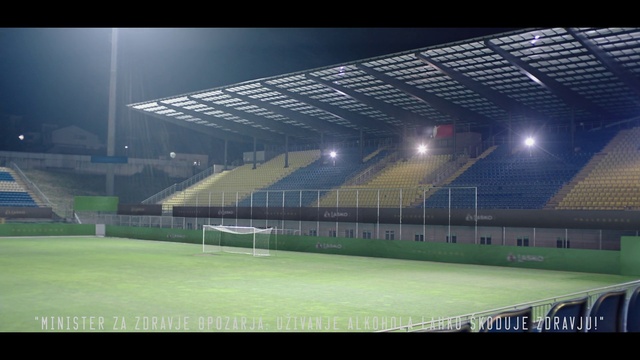 Video Reference: Atmosphere, Floodlight, Field house, Sports equipment, Grass, Player, Sports, Team sport, Stadium, Fence