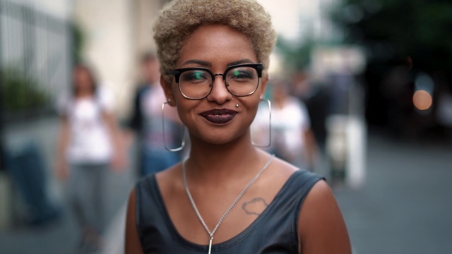 Video Reference: Face, Hair, Glasses, Head, Smile, Vision care, Hairstyle, Shoulder, Eyebrow, Eye