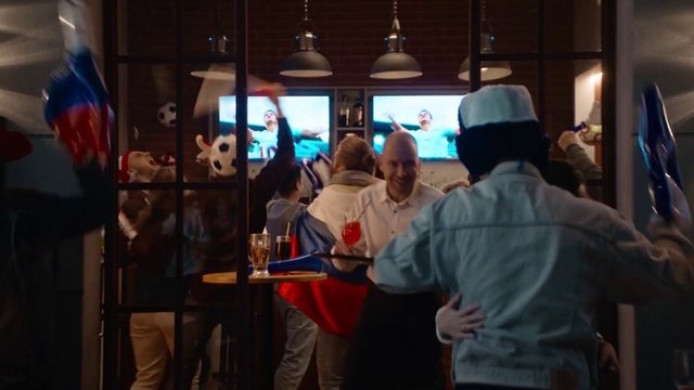 Video Reference: Hat, Flag, Social group, Fedora, Sun hat, Television, Entertainment, Event, Crowd, Fun