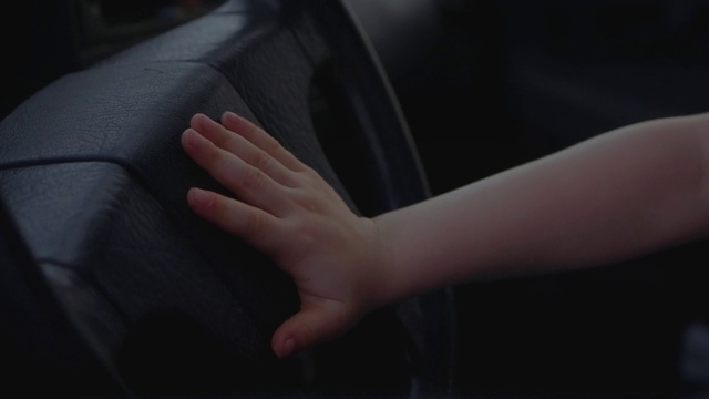 Video Reference: Arm, Human body, Flash photography, Sleeve, Gesture, Finger, Thumb, Personal luxury car, Vehicle door, Window