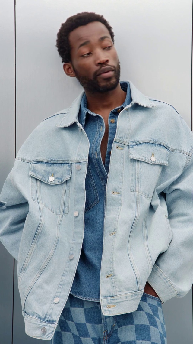 Video Reference: Outerwear, White, Dress shirt, Fashion, Neck, Sleeve, Grey, Beard, Collar, Jacket