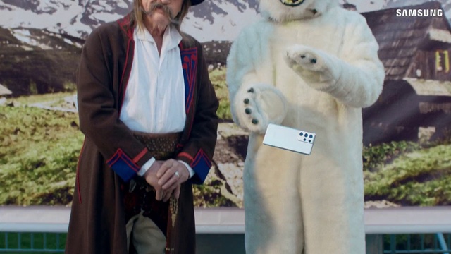 Video Reference: Outerwear, Photograph, Textile, Sleeve, Gesture, Street fashion, Beard, Recreation, Event, Fur