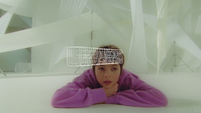 Video Reference: Purple, Sleeve, Comfort, Pink, Violet, Magenta, Happy, Knit cap, Room, Fashion accessory