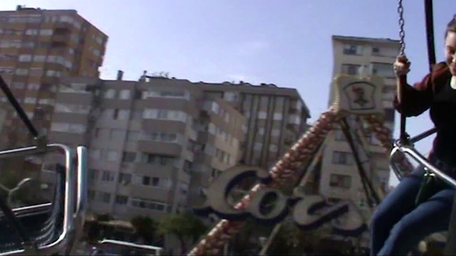 Video Reference: Sky, Building, Motor vehicle, Automotive tire, Window, Wheel, Vehicle, Facade, Automotive mirror, City