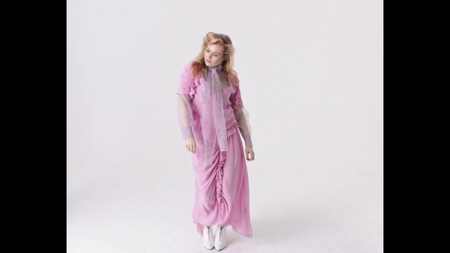 Video Reference: Hair, Arm, Purple, Dress, Neck, Sleeve, Waist, Gesture, Gown, Silk