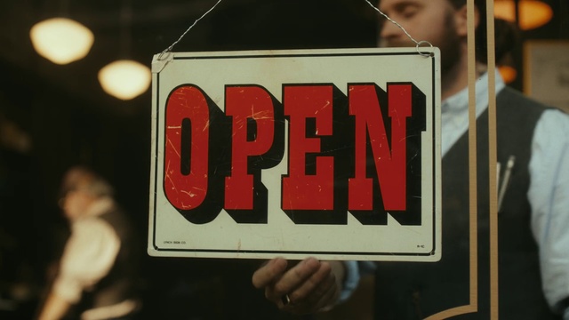 Video Reference: Fashion, Font, Automotive exterior, Event, Signage, Crowd, Motor vehicle, Sign, Advertising, Graphics