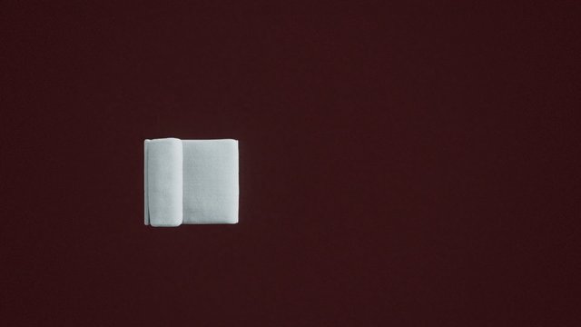 Video Reference: towel, cloth, folded, white, maroon background, minimal, isolated, studio, still life, fabric