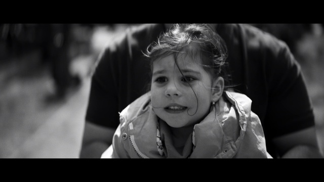 Video Reference: Clothing, Nose, Flash photography, Human body, Smile, Happy, Gesture, Iris, Black-and-white, Style