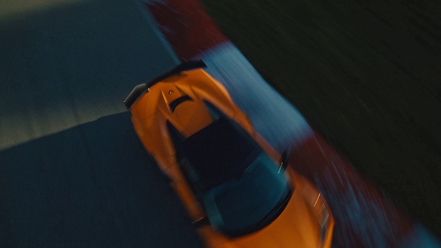 Video Reference: Luggage and bags, Hood, Orange, Bag, Sleeve, Automotive lighting, Personal protective equipment, Tints and shades, Vehicle door, Travel