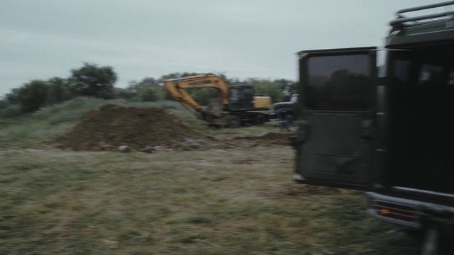 Video Reference: Sky, Vehicle, Tree, Asphalt, Automotive tire, Road surface, Truck, Plant, Gas, Bulldozer