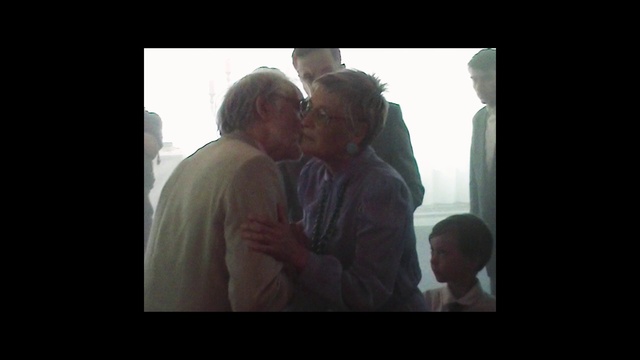 Video Reference: Kiss, Flash photography, Gesture, Font, Fun, Happy, Event, Darkness, Romance, Conversation