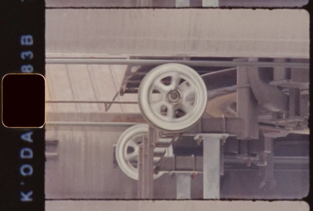 Video Reference: Wheel, Tire, Building, Automotive tire, Rectangle, Motor vehicle, Font, Automotive lighting, Automotive design, Wood