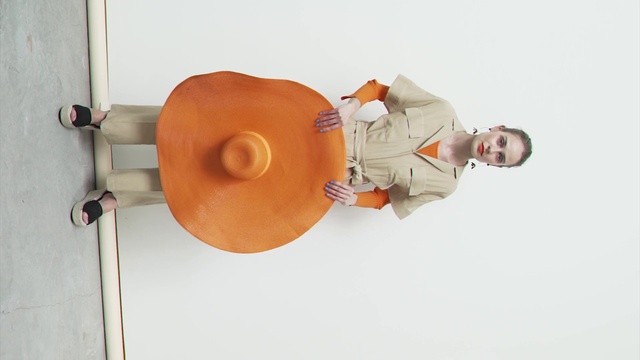 Video Reference: Sleeve, Gesture, Collar, Hat, Wood, Elbow, Machine, Dress shirt, Art, Window