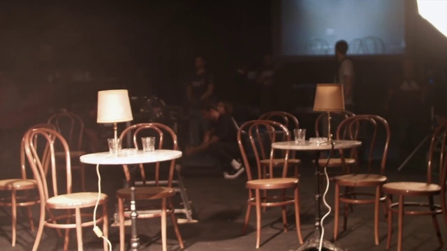 Video Reference: Furniture, Table, Chair, Lighting, Entertainment, Performing arts, Event, Darkness, Wood, Room
