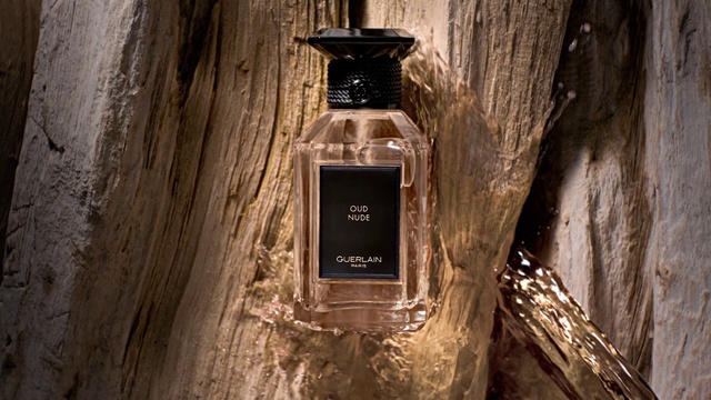 Video Reference: Brown, Wood, Drink, Trunk, Glass bottle, Gas, Tints and shades, Drinkware, Street light, Hardwood