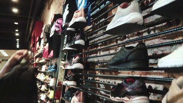 Video Reference: Shoe, Shoe store, Shelf, Building, Shoe organizer, Headgear, Hat, Retail, Eyewear, Sportswear