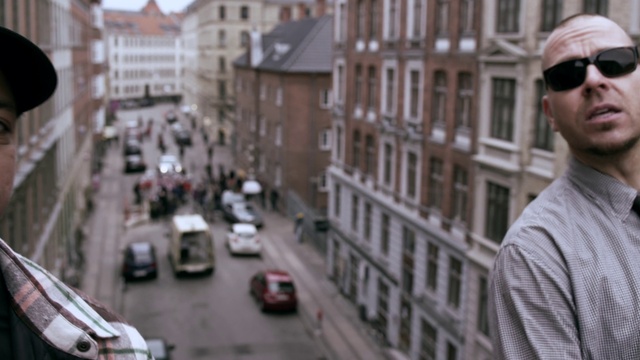 Video Reference: Glasses, Car, Building, Daytime, Vision care, Vehicle, Sunglasses, White, Window, Infrastructure