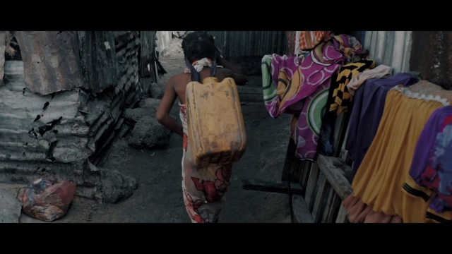 Video Reference: Fashion design, Hat, Street fashion, Event, Fun, Darkness, Visual arts, T-shirt, Costume design, Magenta