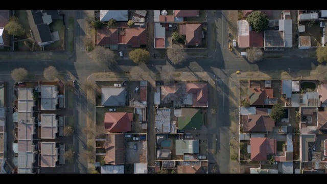 Video Reference: World, Building, Urban design, Neighbourhood, Biome, Residential area, City, House, Landscape, Facade