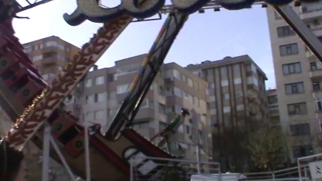 Video Reference: Sky, Building, Window, Urban design, Neighbourhood, Material property, Facade, Crane, Tree, City