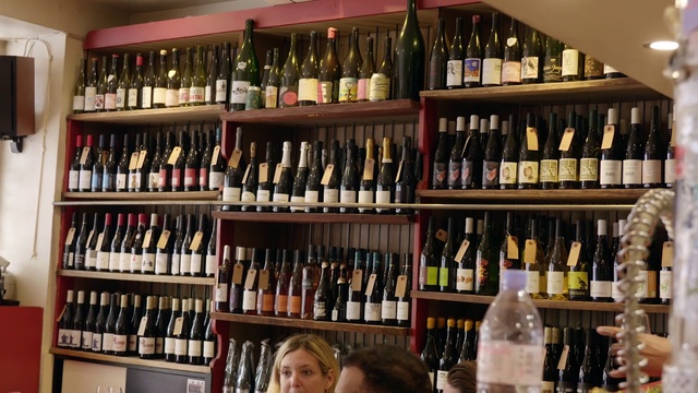 Video Reference: Bottle, Shelf, Product, Drinking establishment, Glass bottle, Wine, Alcoholic beverage, Shelving, Drink, Bottle cap