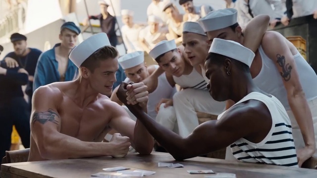 Video Reference: Vertebrate, Muscle, Table, Cap, Gesture, Hat, Headgear, Baseball cap, Sun hat, Crowd
