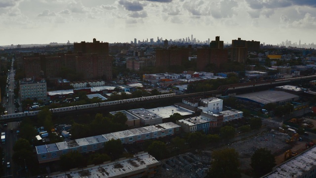Video Reference: Cloud, Sky, Atmosphere, Building, Window, Urban design, Tower block, Cityscape, Residential area, Landscape
