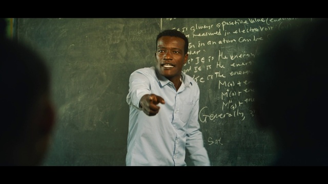 Video Reference: Forehead, Handwriting, Flash photography, Happy, Font, T-shirt, Smile, Event, Room, Darkness