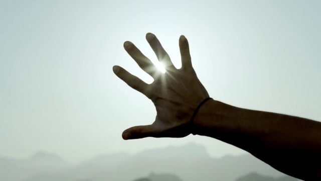 Video Reference: Sky, Hand, Gesture, Finger, Thumb, Wrist, Tints and shades, Sign language, Nail, Personal protective equipment