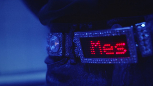 Video Reference: Automotive lighting, Blue, Bumper, Gas, Visual effect lighting, Font, Electric blue, Sky, Display device, Automotive fog light