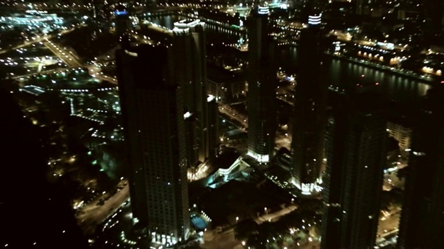 Video Reference: Building, Skyscraper, Tower block, Cityscape, Urban design, Condominium, Landscape, City, Midnight, Electricity