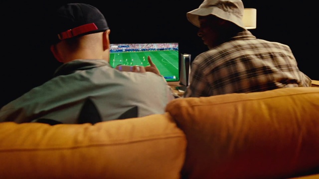 Video Reference: Cap, Sleeve, Baseball cap, Gesture, T-shirt, Interaction, Headgear, Hat, Gadget, Elbow