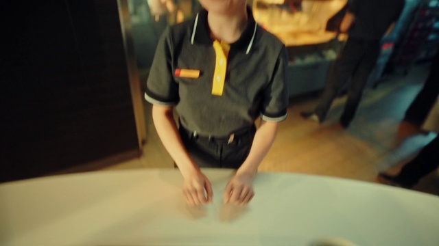 Video Reference: Sleeve, Gesture, Table, Elbow, T-shirt, Wrist, Polo shirt, Flooring, Gadget, Recreation