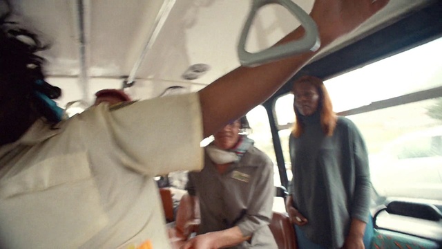 Video Reference: Hand, Vehicle, Motor vehicle, Gesture, Hat, Vehicle door, Fun, Air travel, Youth, Event