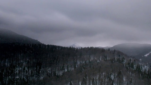 Video Reference: Cloud, Sky, Plant, Mountain, Tree, Slope, Highland, Grey, Natural landscape, Snow