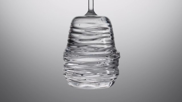 Video Reference: plastic bottle, water, clear container, hanging, isolated, gray background, close-up, studio shot, transparent, rippled surface, minimalist, beverage, container, still life