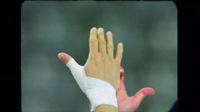 Video Reference: Gesture, Finger, Thumb, Sign language, Wrist, Nail, Service, Font, Art, Visual arts