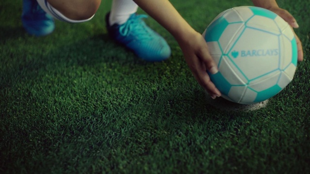 Video Reference: Green, Sports equipment, Blue, Shorts, Football, Toy, Grass, People in nature, Ball, Finger