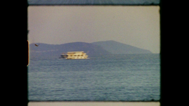 Video Reference: Water, Boat, Water resources, Watercraft, Naval architecture, Sky, Rectangle, Window, Vehicle, Coastal and oceanic landforms