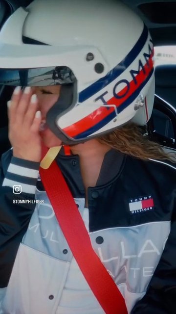 Video Reference: helmet, car interior, racing, seat belt, person, close-up, motorsport, driver, insta-style, jacket, sportswear, portrait, travel, motion, safety, profile