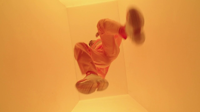 Video Reference: Arm, Leg, Human body, Wood, Orange, Sneakers, Finger, Knee, Comfort, Flooring